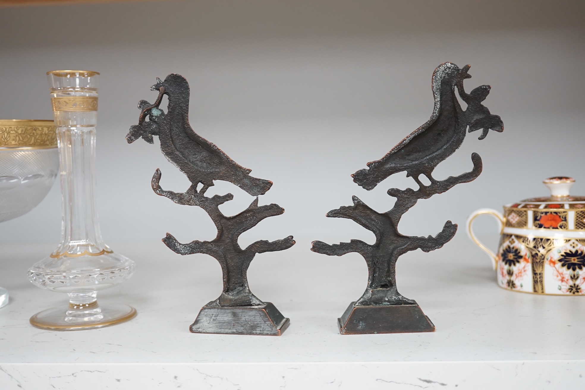 A pair of Victorian cast bronze bookends, formed as doves of peace, 17cm high. Condition - fair to good.